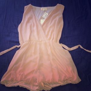 Never WORN plush pink romper